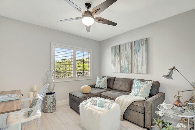 5749 Gemstone Ct Unit 404, Boynton Beach, FL 33437 - living room with baseboards and a ceiling fan