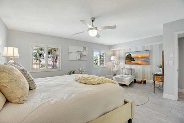5749 Gemstone Ct Unit 404, Boynton Beach, FL 33437 - bedroom with baseboards, a ceiling fan, and wood finished floors