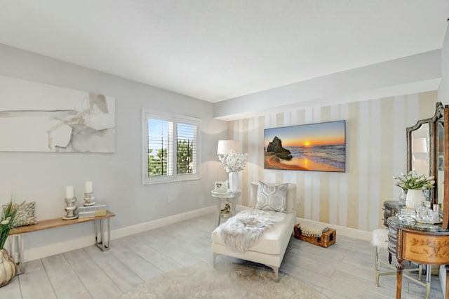 5749 Gemstone Ct Unit 404, Boynton Beach, FL 33437 - living area with baseboards, wood finished floors, and wallpapered walls