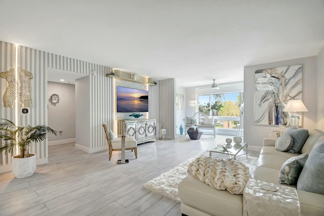 5749 Gemstone Ct Unit 404, Boynton Beach, FL 33437 - living area featuring ceiling fan, baseboards, wood finished floors, and wallpapered walls
