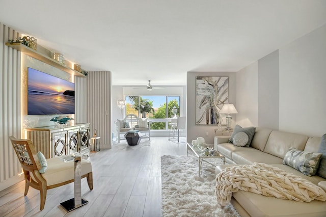 5749 Gemstone Ct Unit 404, Boynton Beach, FL 33437 - living room featuring ceiling fan, baseboards, and wood finished floors