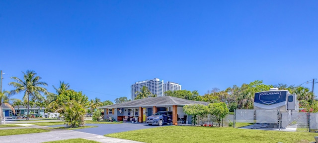 206 Evergreen Dr, Lake Park, FL 33403 - view of building exterior featuring fence