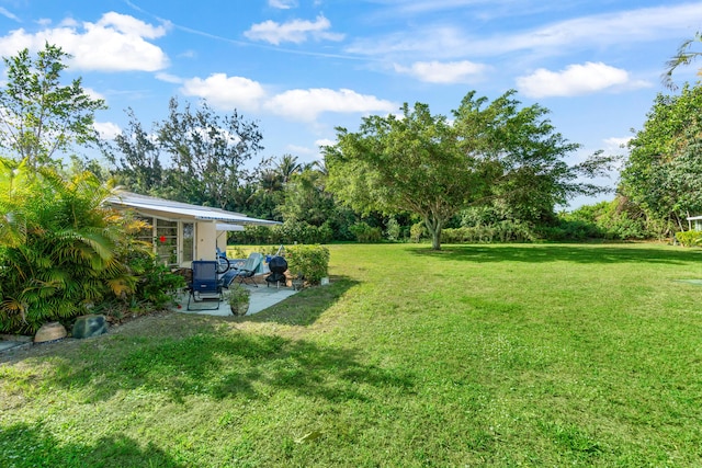 13756 Via Flora Unit A, Delray Beach, FL 33484 - view of yard with a patio