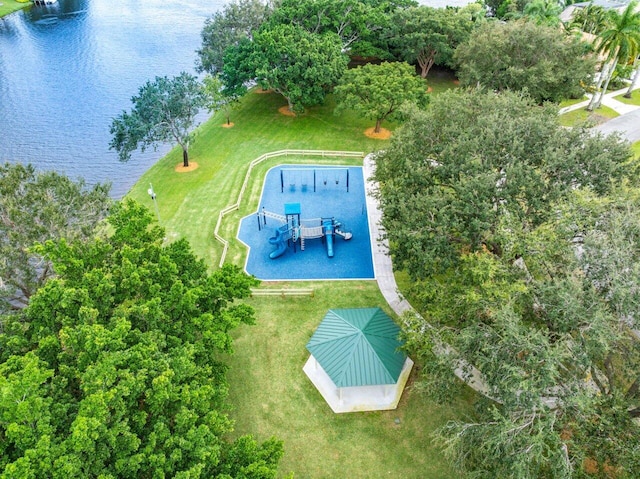 birds eye view of property with a water view