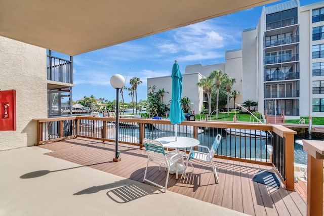 deck featuring a water view