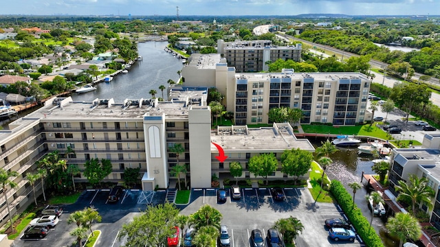 birds eye view of property featuring a water view