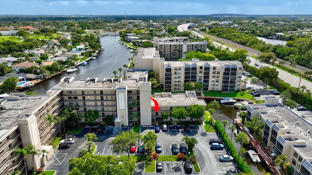 drone / aerial view featuring a water view