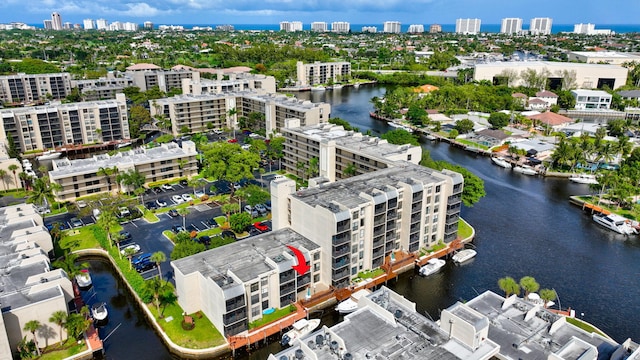 bird's eye view with a water view and a view of city