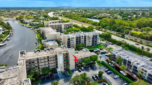 birds eye view of property featuring a water view