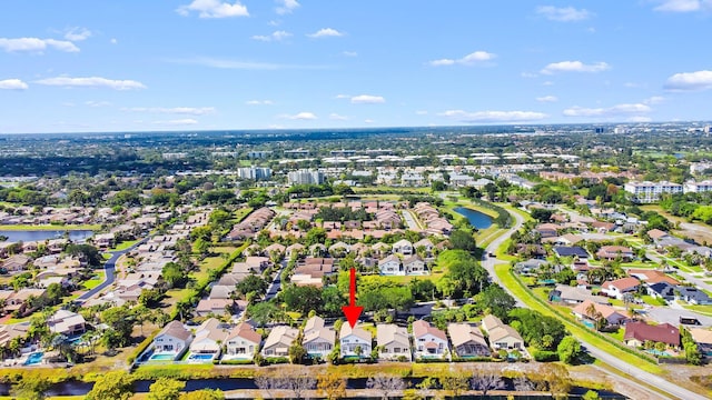 aerial view with a residential view and a water view