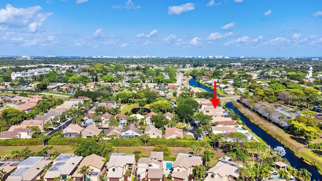 aerial view featuring a water view and a residential view