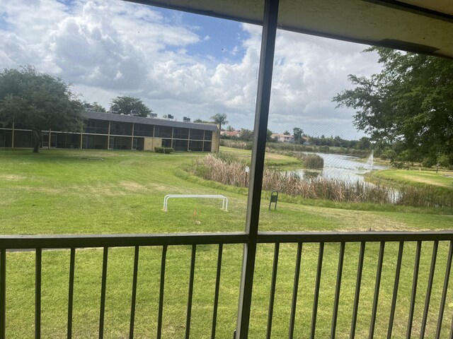1626 Meadows Cir W Unit 1626, Boynton Beach, FL 33436 - view of yard featuring a water view