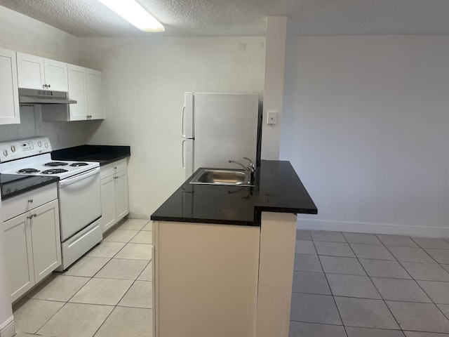 1626 Meadows Cir W Unit 1626, Boynton Beach, FL 33436 - kitchen with a textured ceiling, a sink, light tile patterned floors, under cabinet range hood, and white appliances