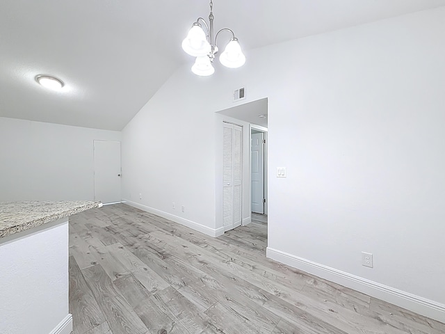 595 Vista Isles Dr Unit 1926, Sunrise, FL 33325 - bonus room with lofted ceiling, light wood-style floors, a chandelier, and baseboards
