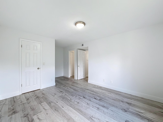 595 Vista Isles Dr Unit 1926, Sunrise, FL 33325 - unfurnished bedroom featuring light wood-style floors and baseboards