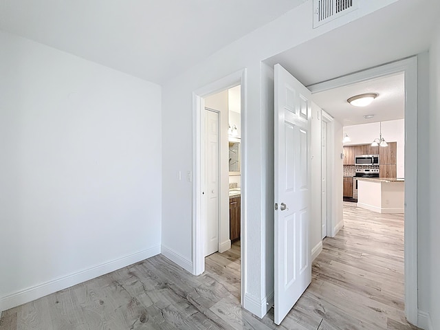595 Vista Isles Dr Unit 1926, Sunrise, FL 33325 - corridor with light wood finished floors and baseboards