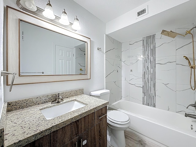 595 Vista Isles Dr Unit 1926, Sunrise, FL 33325 - bathroom with toilet, wood finished floors, vanity, shower / tub combination, and a textured wall