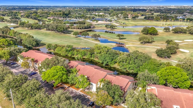 595 Vista Isles Dr Unit 1926, Sunrise, FL 33325 - aerial perspective of suburban area with a golf club, a tree filled landscape, and a nearby body of water