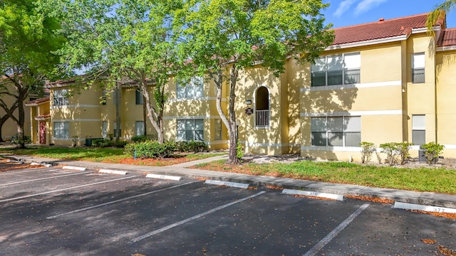 595 Vista Isles Dr Unit 1926, Sunrise, FL 33325 - view of property featuring uncovered parking