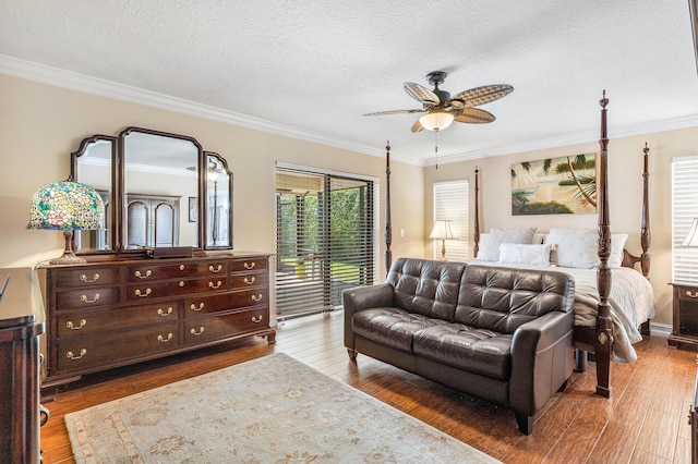 11217 Island Lakes Ln, Boca Raton, FL 33498 - bedroom with wood finished floors, access to exterior, crown molding, a textured ceiling, and a ceiling fan
