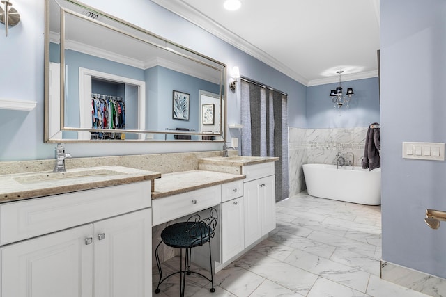 11217 Island Lakes Ln, Boca Raton, FL 33498 - full bath featuring marble look tiles, a freestanding tub, double vanity, crown molding, and a chandelier