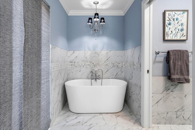 11217 Island Lakes Ln, Boca Raton, FL 33498 - full bath featuring tile walls, marble finish flooring, a chandelier, a freestanding bath, and ornamental molding