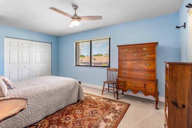 11217 Island Lakes Ln, Boca Raton, FL 33498 - bedroom with light carpet, a closet, baseboards, and a ceiling fan