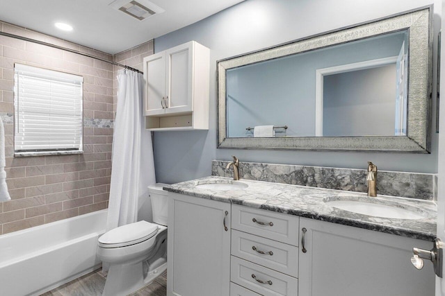 11217 Island Lakes Ln, Boca Raton, FL 33498 - full bath featuring toilet, wood finished floors, double vanity, and shower / tub combo