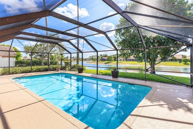 11217 Island Lakes Ln, Boca Raton, FL 33498 - swimming pool featuring a water view and a patio area