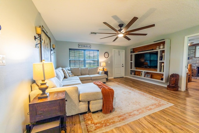 2675 SW 24th Ave, Okeechobee, FL 34974 - living room featuring ceiling fan and wood finished floors