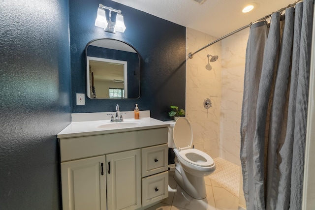 2675 SW 24th Ave, Okeechobee, FL 34974 - full bathroom with toilet, a stall shower, vanity, a textured wall, and tile patterned floors