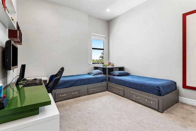 bedroom with carpet floors and recessed lighting