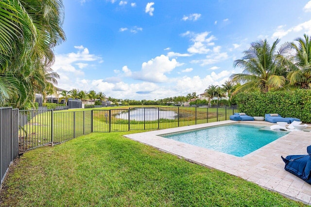 view of swimming pool featuring a fenced backyard, a fenced in pool, a water view, a patio, and a yard