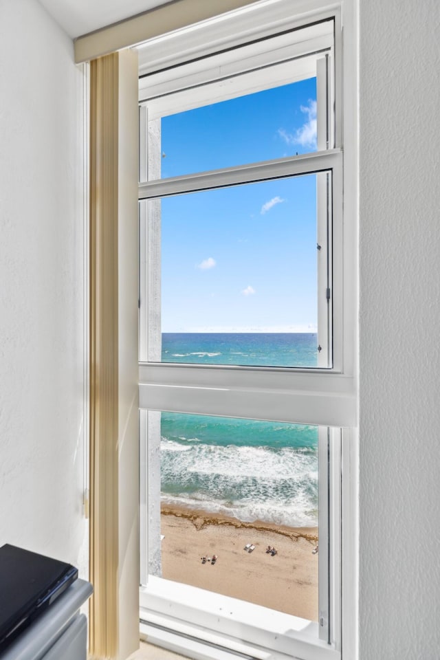 1370 S Ocean Blvd Unit 1808, Pompano Beach, FL 33062 - doorway featuring a water view and a textured wall