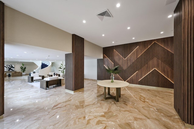 1370 S Ocean Blvd Unit 1808, Pompano Beach, FL 33062 - community lobby featuring wooden walls and recessed lighting
