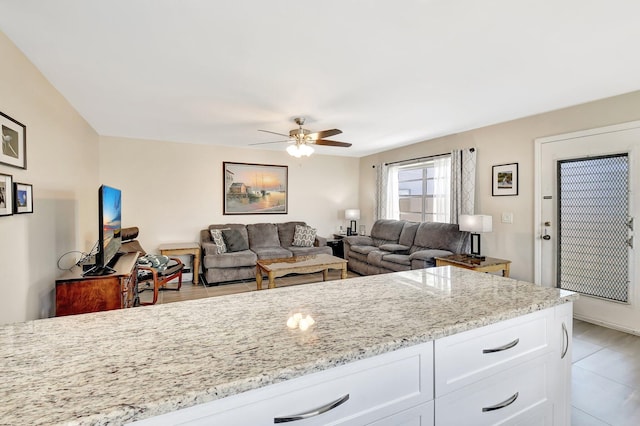 living room with a ceiling fan