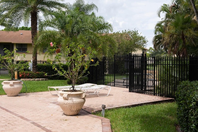 exterior space with fence and a patio area