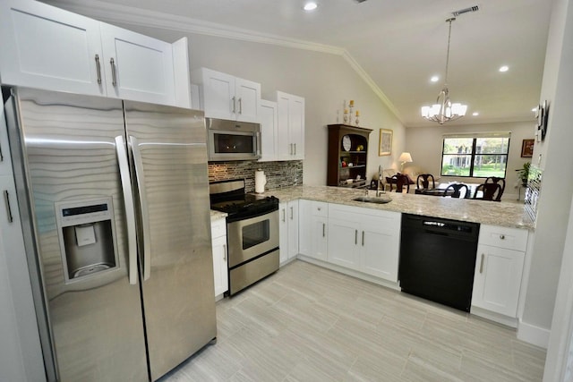 kitchen with an inviting chandelier, appliances with stainless steel finishes, crown molding, and a sink