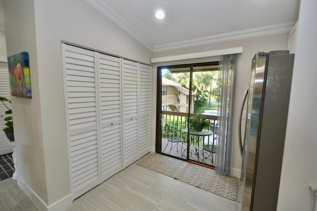 doorway to outside with crown molding, recessed lighting, and baseboards