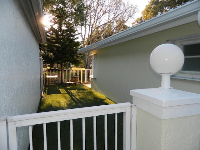 view of side of home with fence