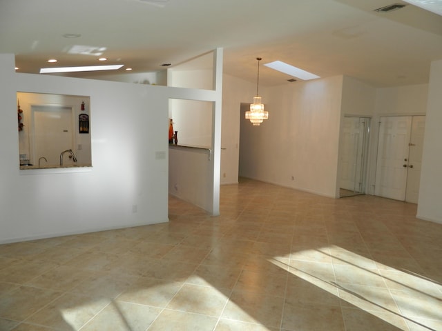 empty room with recessed lighting, a chandelier, tile patterned floors, visible vents, and vaulted ceiling