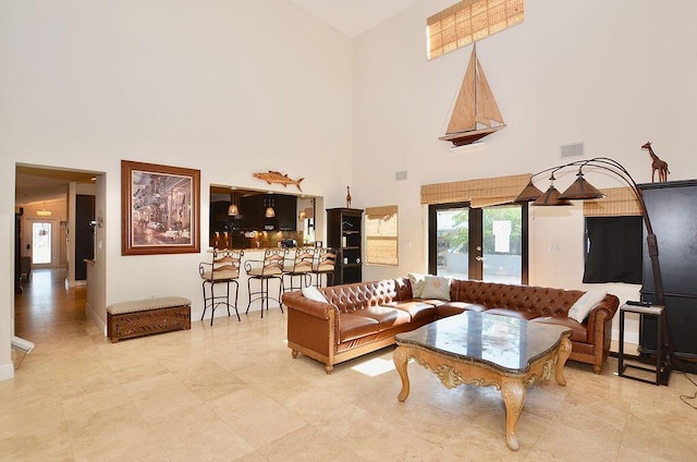 283 NE Sagamore Terrace, Port Saint Lucie, FL 34983 - living room with visible vents and a high ceiling