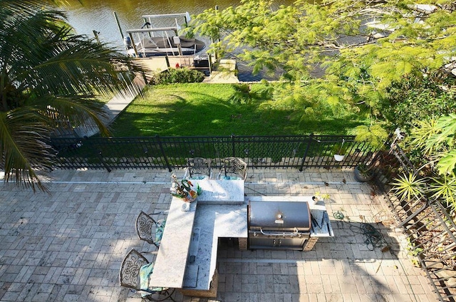 283 NE Sagamore Terrace, Port Saint Lucie, FL 34983 - view of patio featuring fence
