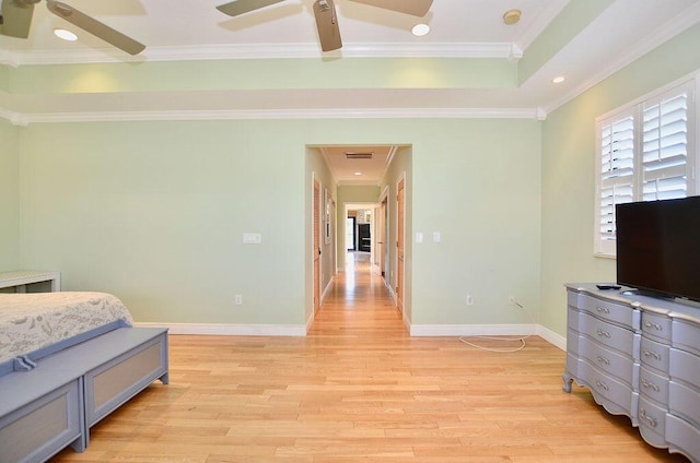 283 NE Sagamore Terrace, Port Saint Lucie, FL 34983 - bedroom with visible vents, crown molding, light wood-style flooring, and baseboards