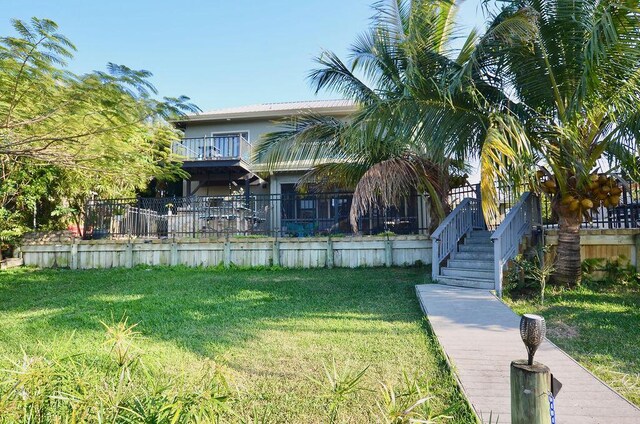283 NE Sagamore Terrace, Port Saint Lucie, FL 34983 - view of yard featuring fence
