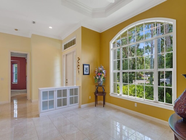 interior space featuring recessed lighting, baseboards, visible vents, and ornamental molding