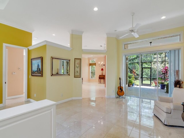 interior space with recessed lighting, baseboards, ornamental molding, and ceiling fan with notable chandelier