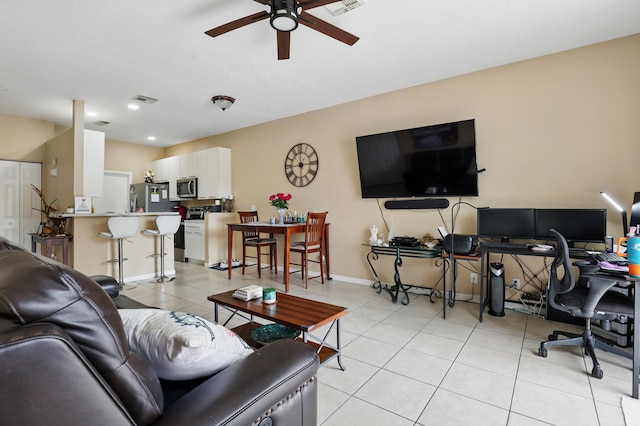 living room with recessed lighting, visible vents, a ceiling fan, light tile patterned floors, and baseboards