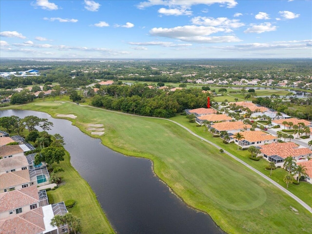 8365 SE Double Tree Dr, Hobe Sound, FL 33455 - aerial view of residential area with a golf club, a nearby body of water, and a tree filled landscape