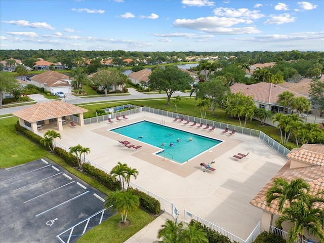 8365 SE Double Tree Dr, Hobe Sound, FL 33455 - community pool with fence and a residential view